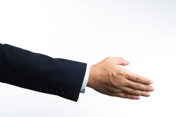 Hombre de negocios con la mano derecha extendiendo la mano para dar la mano
 - Foto, Imagen