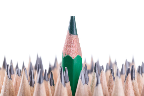 One sharpened green pencil among many ones - Photo, Image