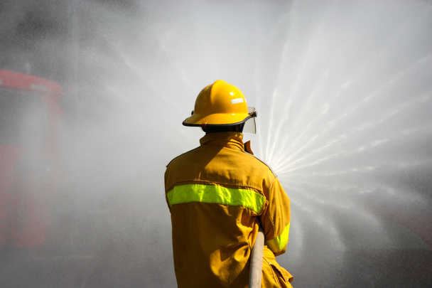 Firefighter Working - Фото, изображение