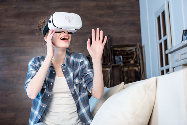 Woman in virtual reality headset - 写真・画像