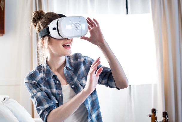 Woman in virtual reality headset - 写真・画像