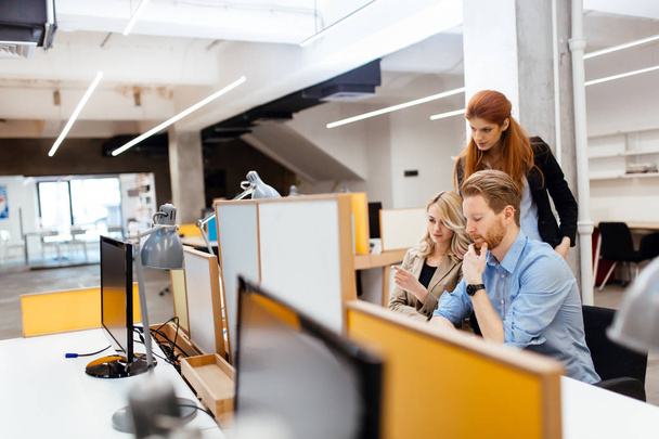 Designers working as a team in office - Foto, Bild