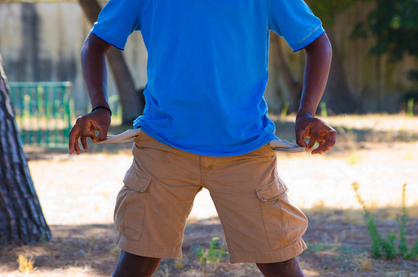 empty pockets of a black boy - Foto, imagen