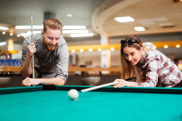 Couple playing snooker - Photo, image