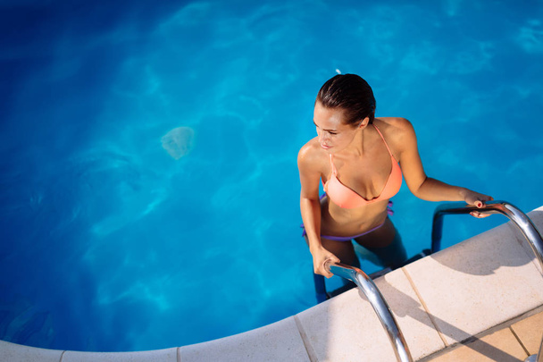 Sexy woman in pool   - Zdjęcie, obraz