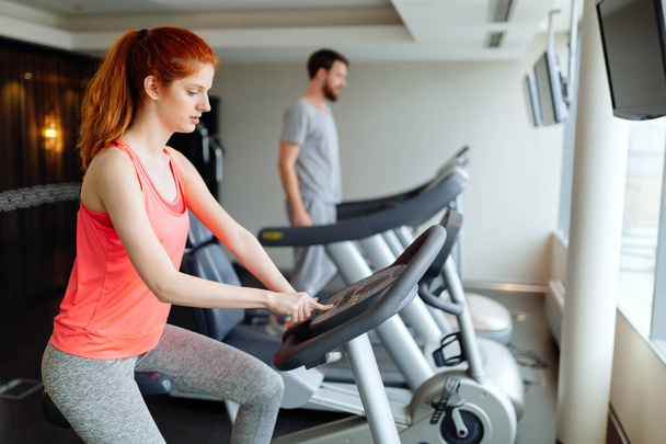 People workout in gym - Фото, зображення