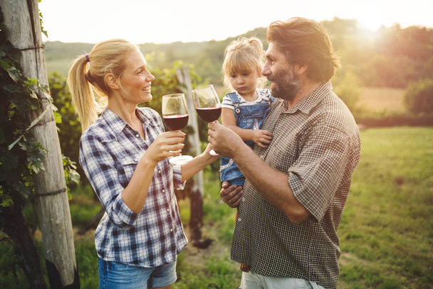Winegrower family tasting wine - Fotografie, Obrázek