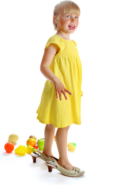 The girl in a yellow dress - Foto, imagen
