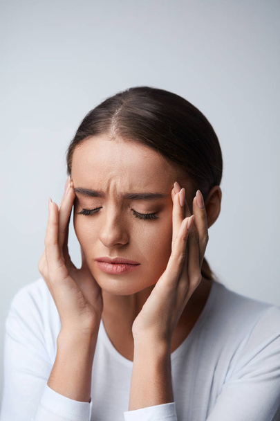 Headache. Beautiful Woman Feeling Stress And Strong Head Pain - Foto, imagen