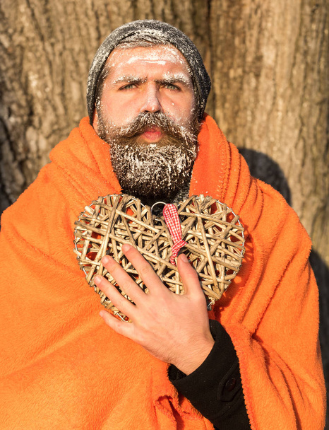 Man in blanket with heart - Фото, изображение