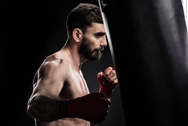 Boxer with punching bag - Photo, Image