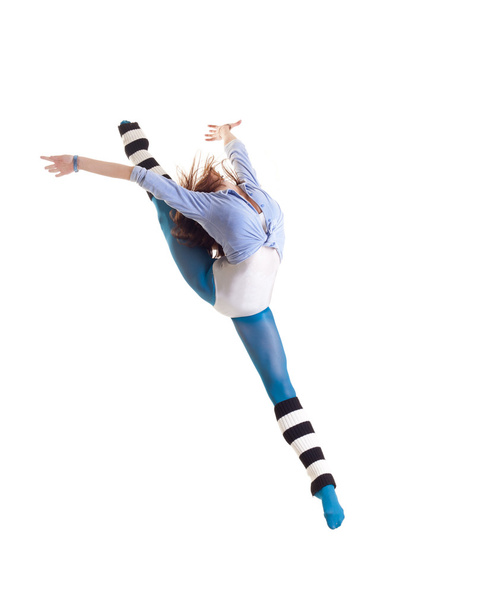 Modern ballet dancer dancing on the white studio background - Photo, image