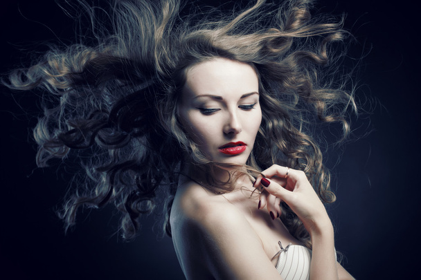 Closeup portrait of glamour young girl with beautiful long hair - 写真・画像