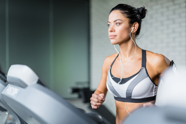 Woman exercising in gym - Foto, imagen