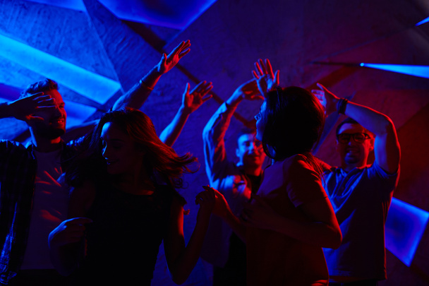 Crowd of friends dancing - Фото, изображение