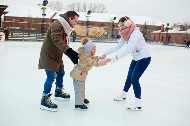 Family on skating-rink - Photo, Image