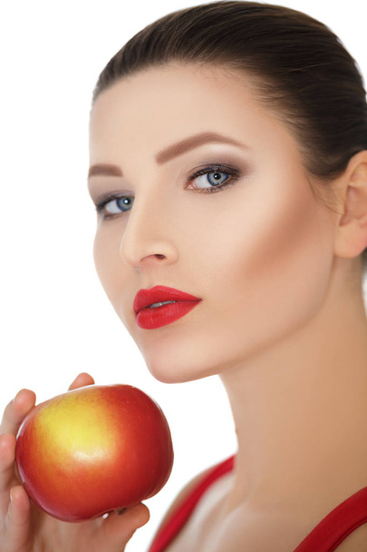 woman holding a dark red Apple. healthy eating - Foto, Imagen