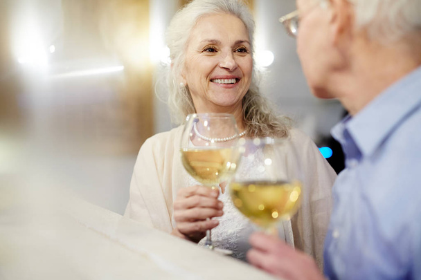 Seniors toasting with wine - Photo, Image