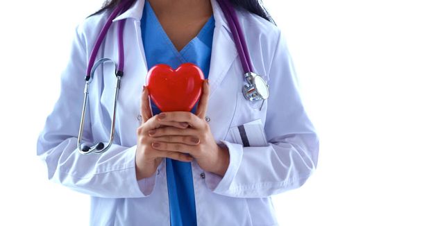 Doctor with stethoscope holding heart, isolated on white background - Foto, Imagem