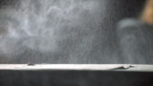Closeup spritzing cloth with a spray bottle filled with water and ironing it - Footage, Video