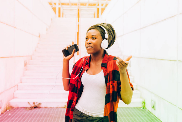 woman listening music with headphones - Photo, Image