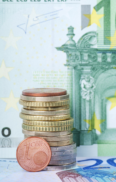 Various Euro coins against banknotes - Fotografie, Obrázek