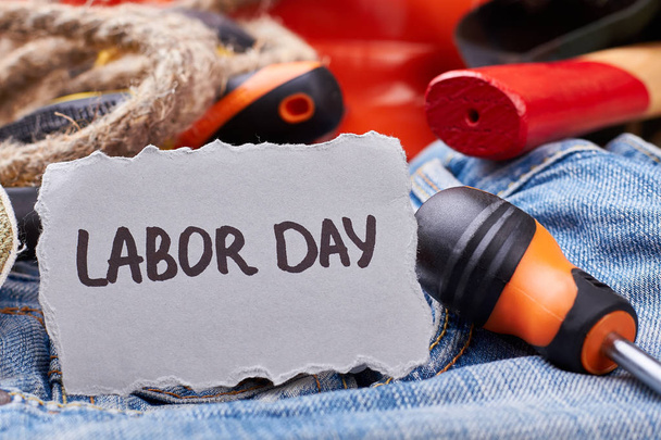 Labor Day card near screwdriver. - Photo, Image