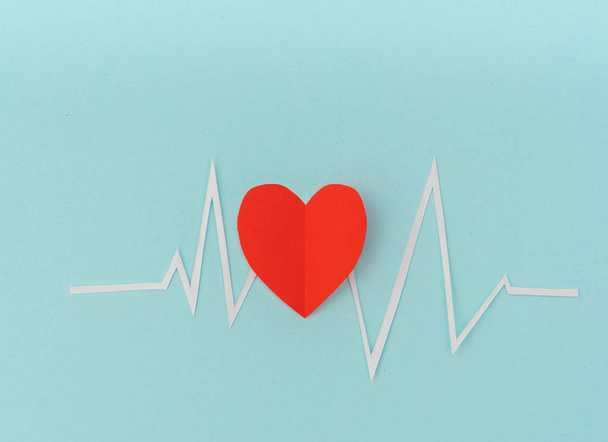 Paper cut of cardiogram of heart rhythm for Valentines Day . - Фото, изображение