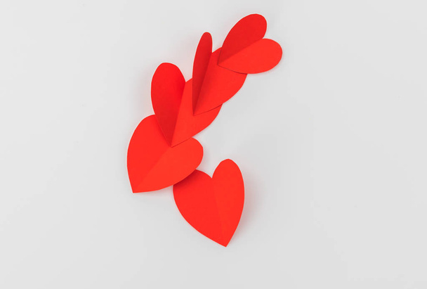 Red paper origami heart  on white background .  - Photo, Image