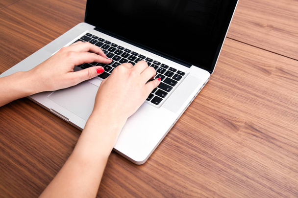 female hands typing on laptop - Foto, imagen