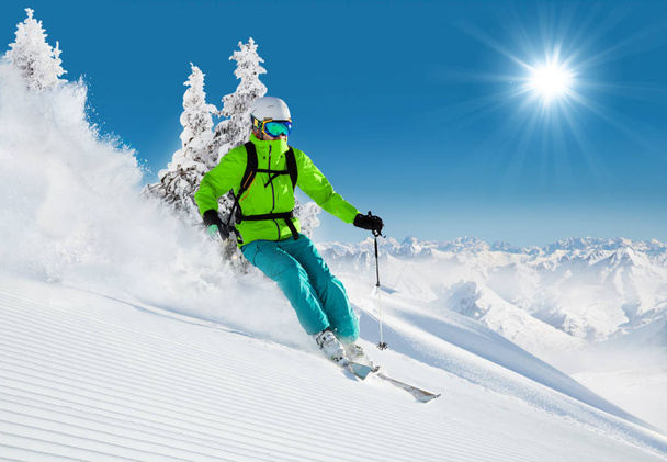 Skier on piste running downhill - Photo, Image