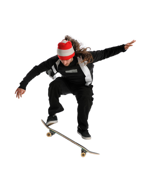 SkateboarderJumping - Foto, Imagem