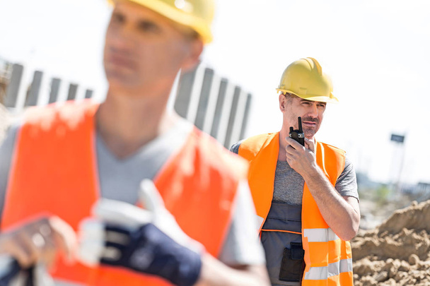 male worker using walkie-talkie - Фото, зображення