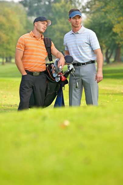 men standing on golf course  - Фото, зображення