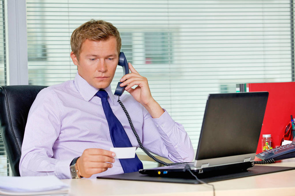 Businessman talking on telephone  - Photo, image