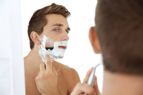 handsome man shaving - Photo, Image