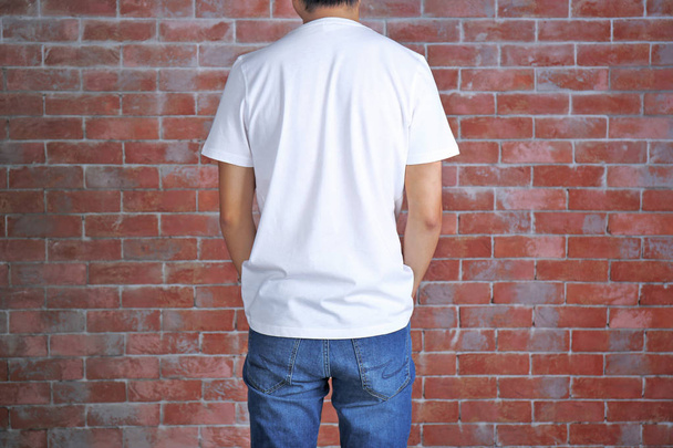 Young man in blank t-shirt - 写真・画像