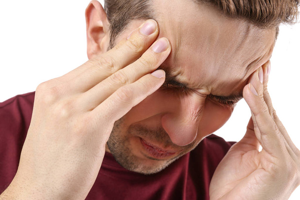 Человек, страдающий от головной боли - Фото, изображение