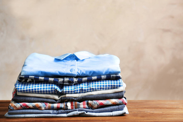 Stack of colorful shirts - Foto, afbeelding