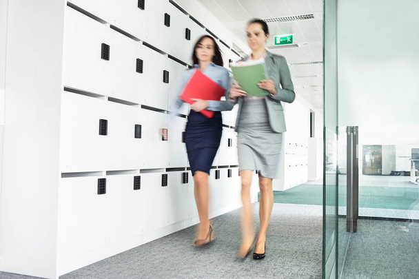 businesswomen walking in office - Photo, Image