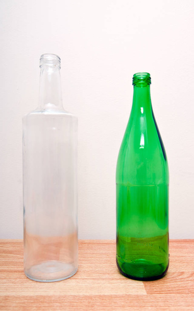 Green and clear glass bottles - Photo, image