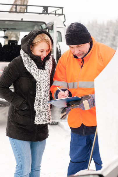 Woman fill document broken car snow mechanic - Fotoğraf, Görsel