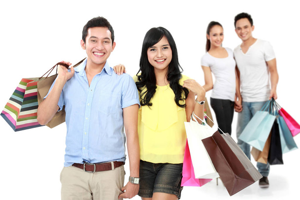 Happy people with shopping bags - Foto, imagen