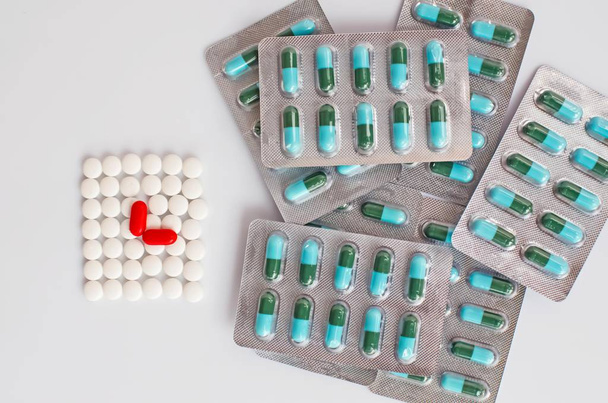 white pills medicine&antibiotics in blister on white background - Photo, Image