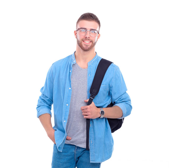 Young man standing with handbag isolated on white background - Fotoğraf, Görsel