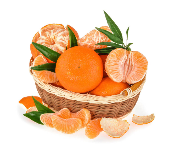Tangerines with leaves and slices on white background - Photo, Image