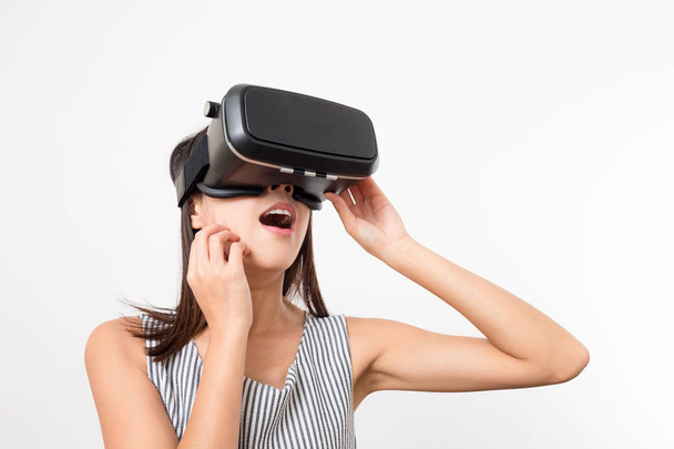 Woman feeling scary with using VR device - Photo, Image