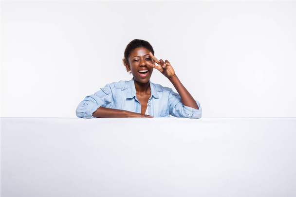 black woman on white empty panel  - Foto, Imagen