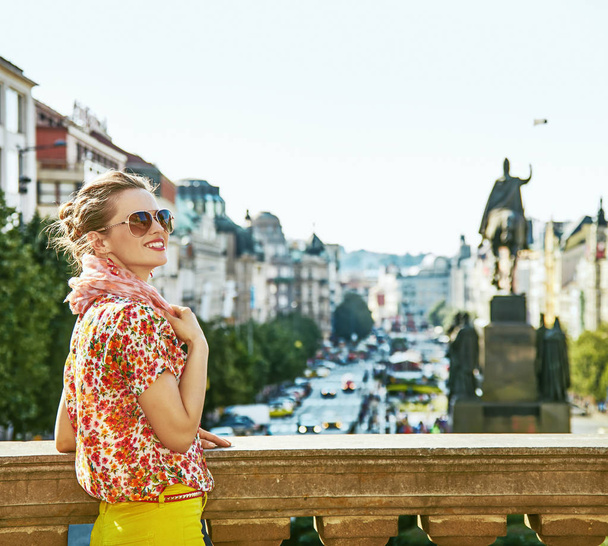tourist woman on Vaclavske namesti in Prague having excursion - Photo, image