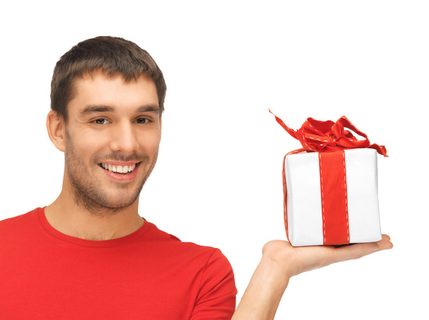 Handsome man with a gift - Foto, imagen